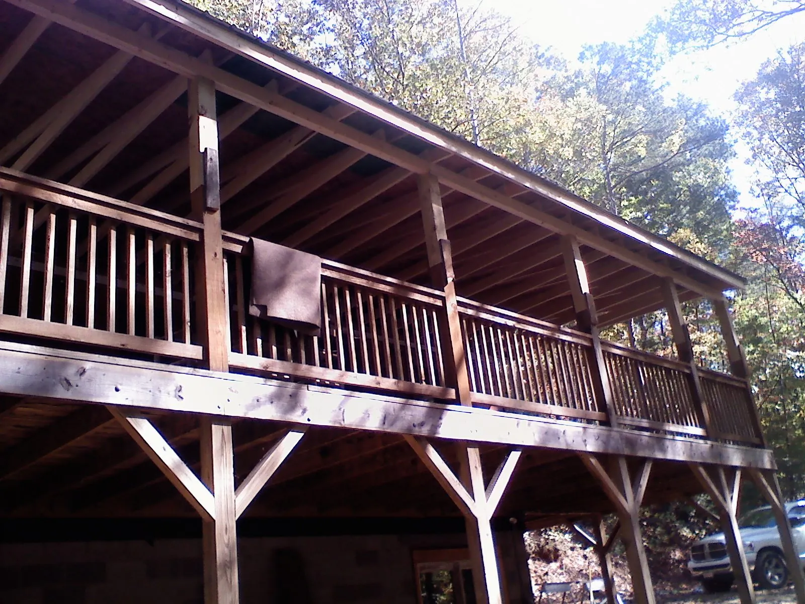 Timber framing under a new elevated porch and deck — Roof Leak Repair in Lindstrom by Roofing Brothers